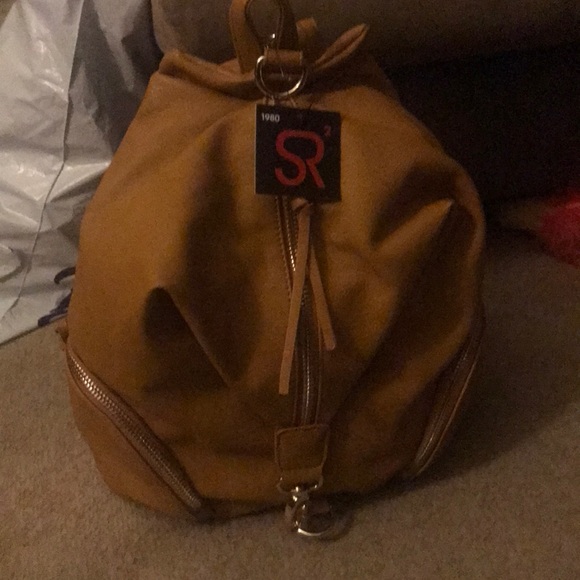 Handbags - Julian style backpack from posh (non leather )